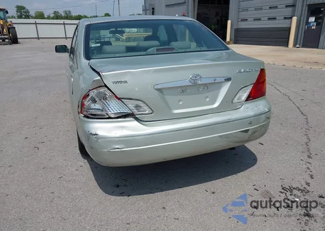2000 Toyota Avalon Xl z USA, uszkodzony, nr VIN 4T1BF28B6YU034369